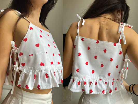 Rosie ruffle top sewing pattern showing front and back view with shoulder ties and ruffle hem.