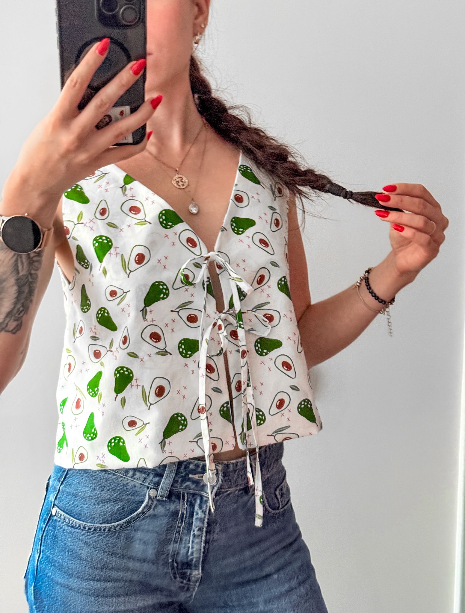 Finished Lani front tie top sewing pattern worn as a relaxed summer top with front tie detail