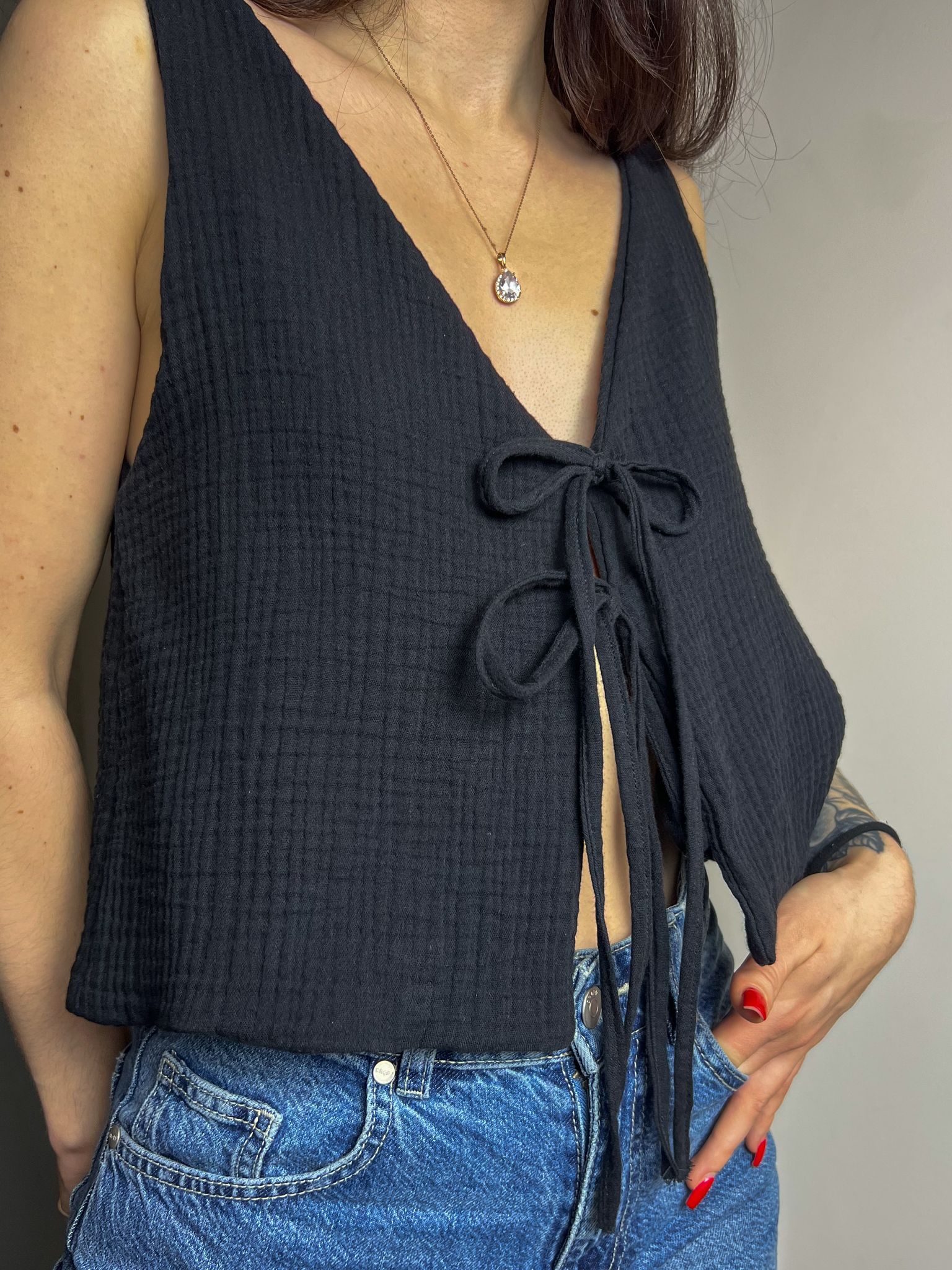 Finished Lani front tie top sewn in lightweight fabric showing the relaxed fit and front tie closure