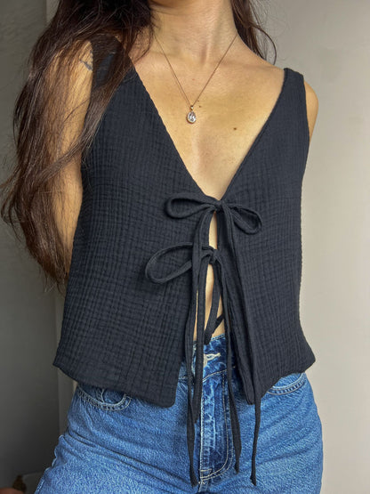 Close-up of the finished Lani front tie top sewn in muslin showing the deep neckline and front tie detail