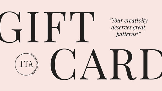 Gift card design with 'ITA' branding and text on a pink background