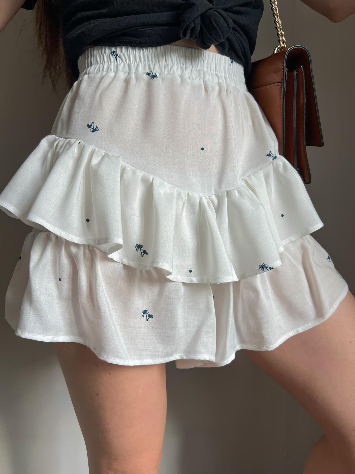 ruffled elastic waist lounge shorts made from lightweight white fabric, shown as a finished garment from a beginner friendly sewing pattern.