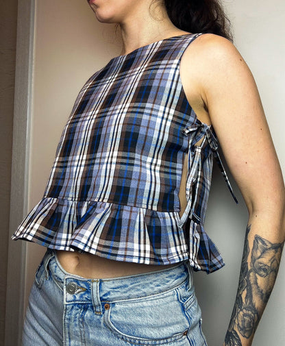 Lila ruffle tie top sewing pattern showing side tie closure and ruffle hem on finished garment.