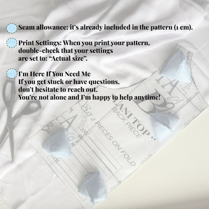 Sewing weights on top of sewing pattern and a pair of scissors on a white background. Seam allowance and other sewing pattern information as overlay.